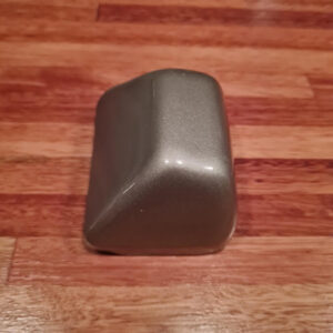 Cover for numberplate light bracket