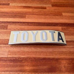 Toyota Emblem curve to right steel