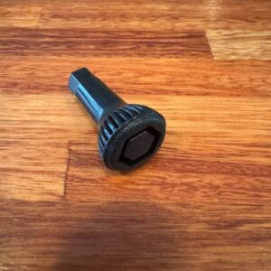 Handbrake on floor adjuster knob