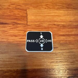 Hi-lo beam and indicator plate