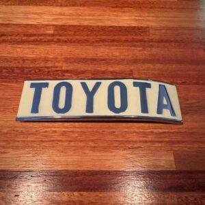 Toyota Emblem curve to the right