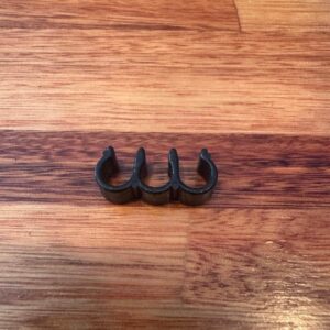 Clamp for sparkplug cord