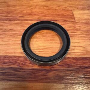 Front knuckle to shaft oil seal