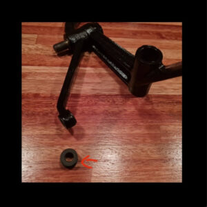 Transfer lever link grommet